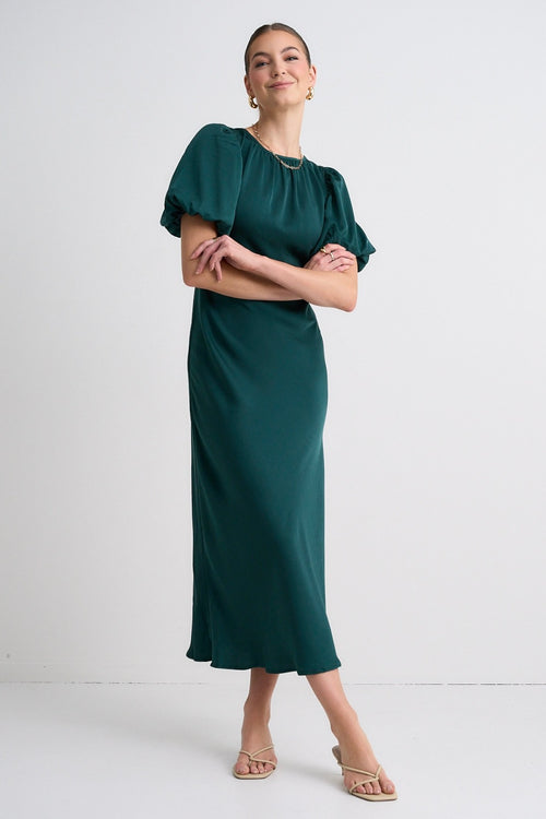 model wears a Green Satin Maxi Dress 