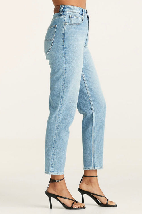 model wears blue jeans