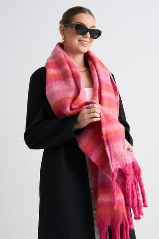 Model wears a pink and orange scarf